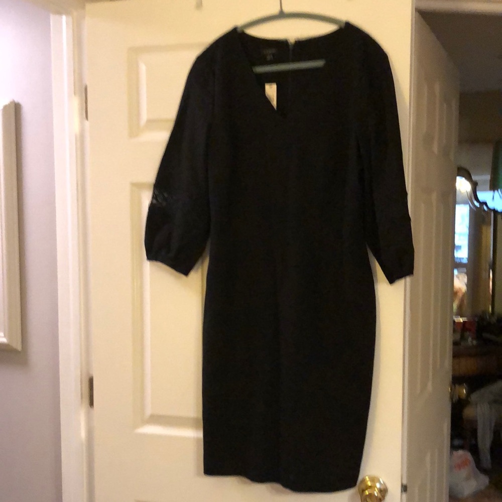Classic NWT Talbots black dress with lace trim peekaboo sleeve at cuff.